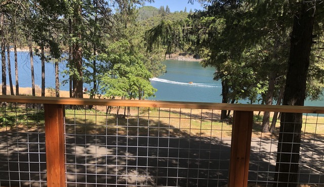 Lakefront house with 1000 sq/ft of decking with unobstructed view of the water.