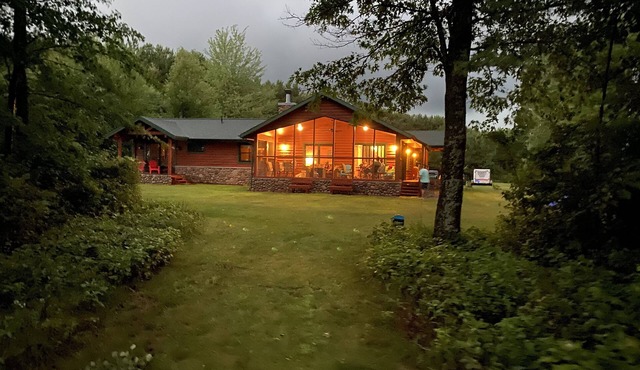Lakefront House with Amazing Sun Room and Jacuzzi!