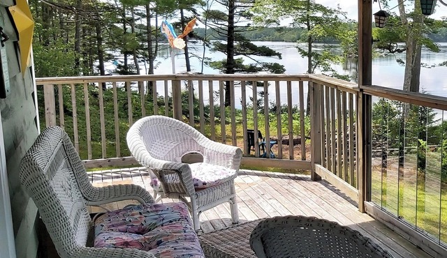 Lakefront Living in a Sunset Cove with kayaks