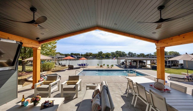 Lakefront Luxury: Sunrise Views, Pool, Dock & Walk to Dining!
