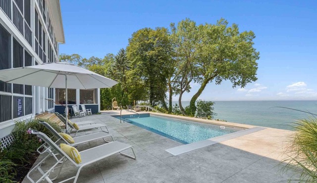 Lakefront Modern Mansion With Heated Pool 9BR's On Private Sandy Beach