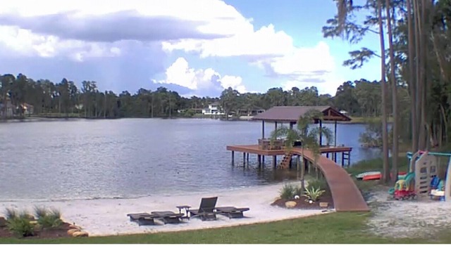 Lakefront Oasis. Sandy Beach and dock await your relaxation!
