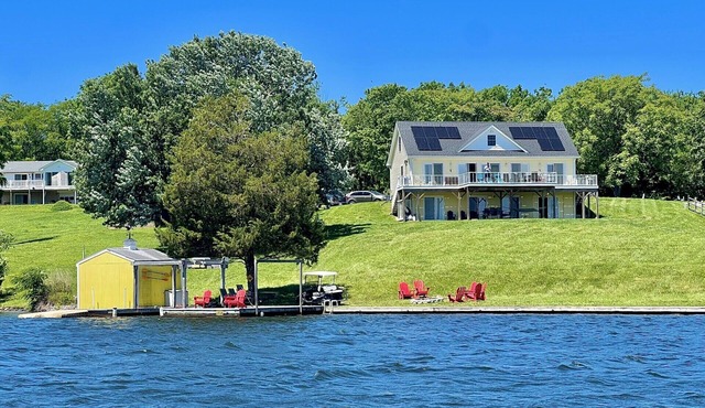 Lakefront of 240 feet on Private side. Lake and Sunrise view from every room!