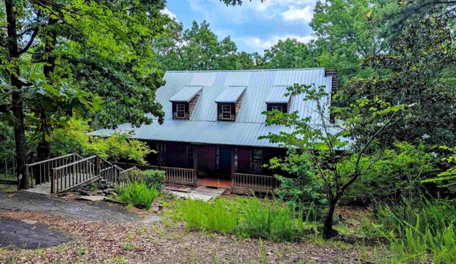 Lakefront on Greer’s Ferry in secluded upscale neighborhood.