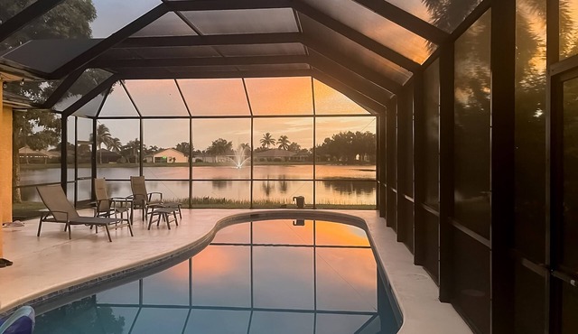 Lakefront one-level home with pool, screened lanai & W/D - snowbird-friendly