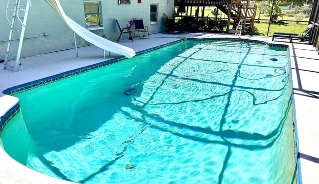 Lakefront Retreat with Pool, Slide, Kayaks, Fishing, Sunset Views & Family Fun