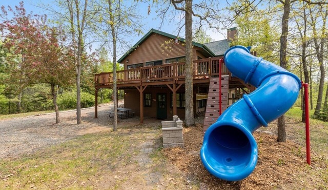 Lakefront retreat on Island Lake. Two cabins, 7 bedrooms, sand beach, privacy+