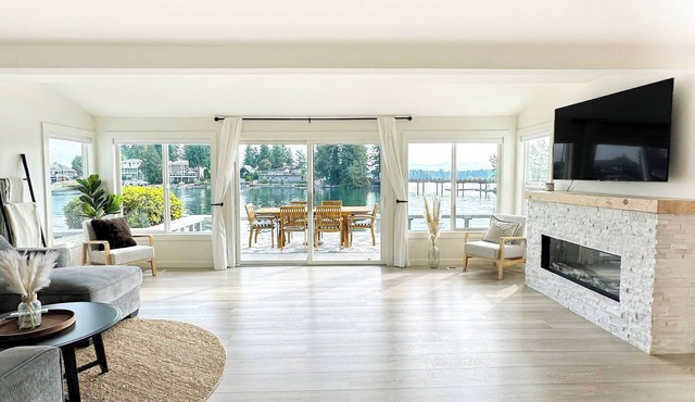 Lakefront Retreat with Private Dock's, Stunning views, Fireplaces and hot tub!