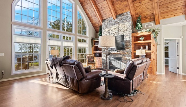 Lakefront retreat with hot tub, water view, game room, home theater & dock