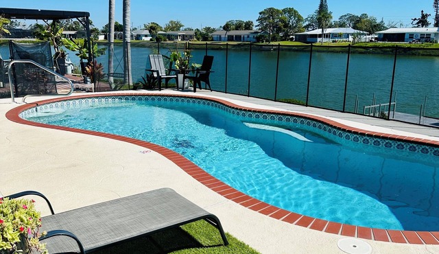 Lakefront Retreat with pool, close to beach!