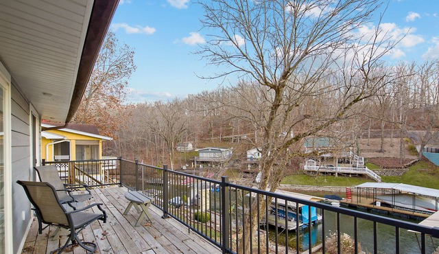 Lakefront retreat with a private dock, furnished patio & washer/dryer