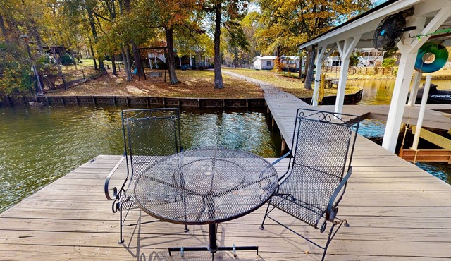 Lakefront retreat with kayaks, grill, games, open interior, & W/D - dog-friendly