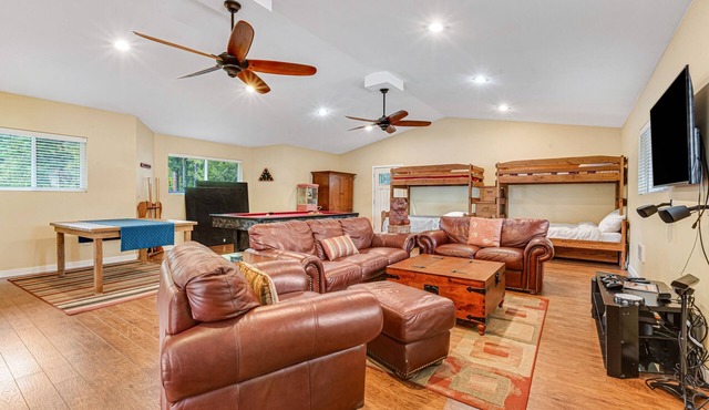 Lakefront retreat with kayaks, canoe, game tables, children's items, and W/D