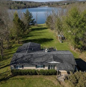 Lakefront Retreat with Hot Tub, Dock & Firepit Views in Woodridge, New York