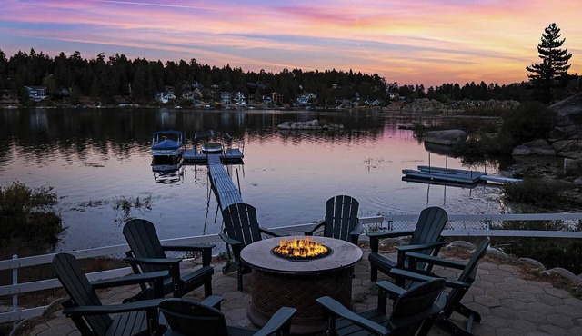 Lakefront Splendor:Spectacular Lakefront Property w/Private Dock! Pool Table + Foosball Table! Spacious Outdoor Deck! Patio & Yard w/Firepit!