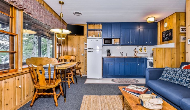 Lakefront suite at a vintage resort with communal dock, rowboats & firepit