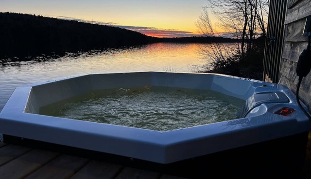 Lakefront Tiny Home w/ Hot Tub + Sunset Views