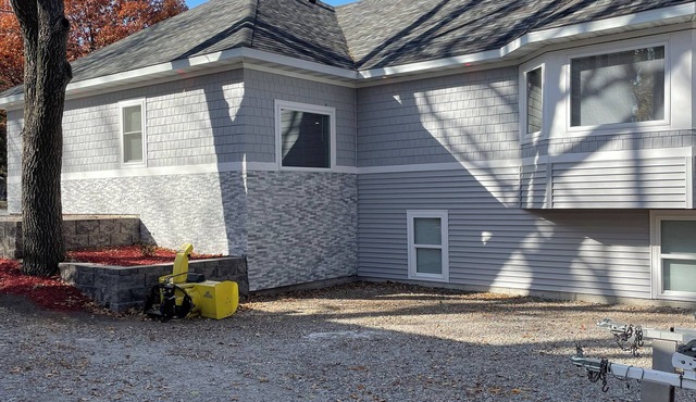 Lakeside 6-bdrm 4-bath with game room, golf cart & semi private dock.