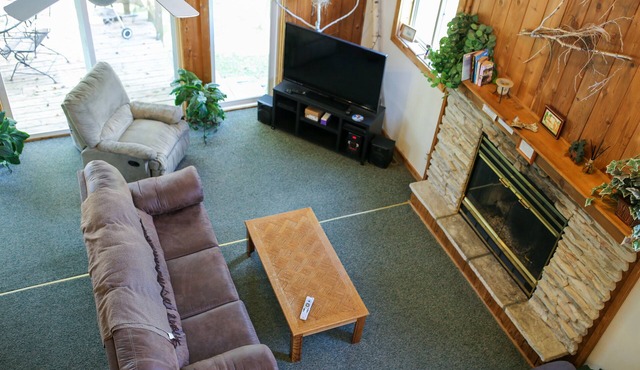 Lakeside cabin with Hot Tub and full kitchen! Sleeps up to 12 people.