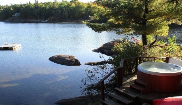 Lakeside Cottage near Adirondacks, Hot Tub, Pontoon Boat, Kayaks & Paddle Board