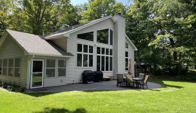 Lakeside home on one acre with private beach 90 minutes from the Twin Cities