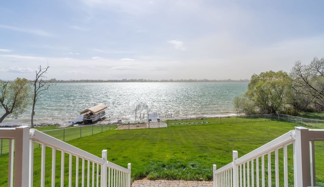 Lakeside home w/dock, gamerooms, fenced yard
