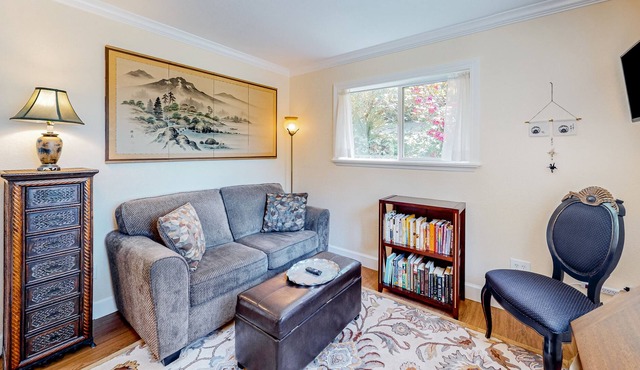 Lakeside home with inspirational water views, lush surroundings, & free WiFi