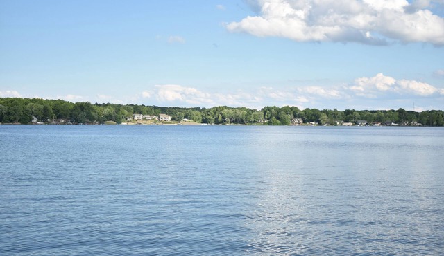 Lakeside living awaits at beautiful Lake Milton, OHn with dock across the street