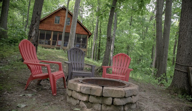 Lakeside Log Cabin with cozy stone fireplace