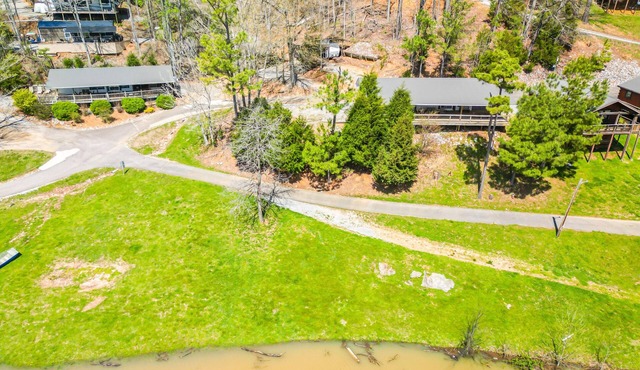Lakeside Place 2 (Sleeps 1-4) - Tiny living space with a queen and full size beds overlooking Lake Barkley.