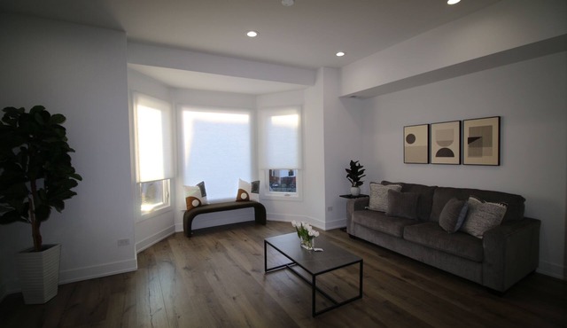 Lakeside Retreat: Charming Greystone Near Downtown