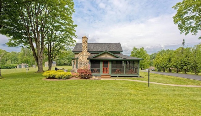 Lakeside Retreat with Guest Cottage on 5+ Acres