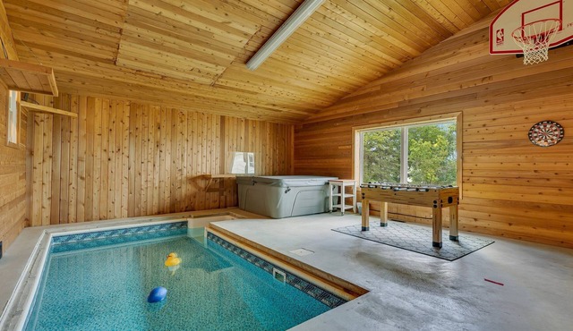 Lakeside retreat with indoor pool, hot tub and sauna