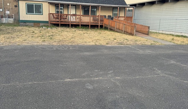 Lakeside Retreat with Big Porch, Extra Parking, and Prime Downtown Location