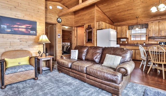 Lakeside wilderness resort cabin with dock, fire pit, on-site store, bait shop!