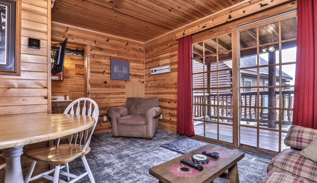 Lakeside wilderness resort cabin with dock, fire pit, on-site store, bait shop!