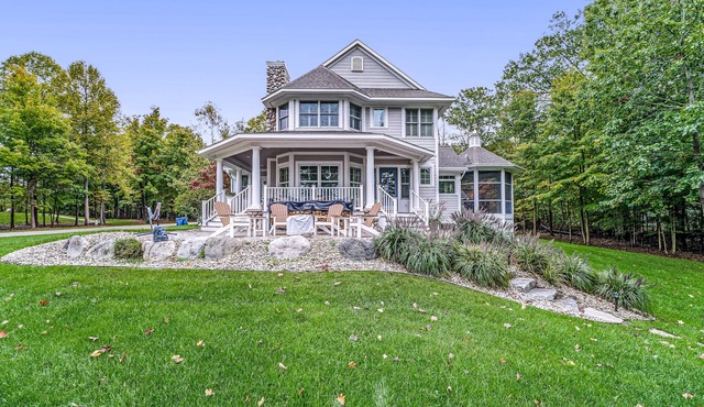 Lakeview home with beach access, private pickleball court, firepits & fireplace