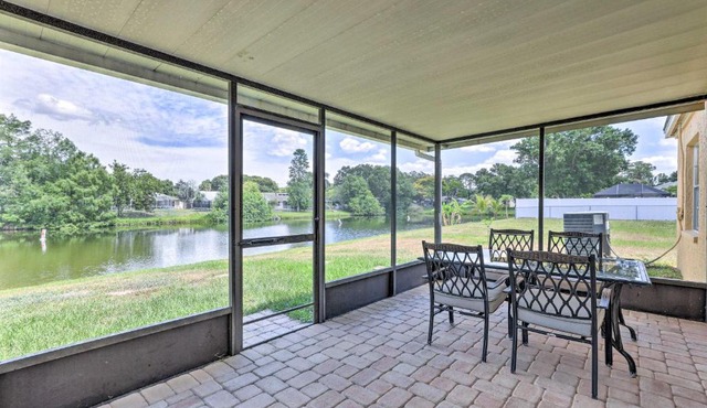 Lanai and Pond at Tranquil Bradenton Retreat!