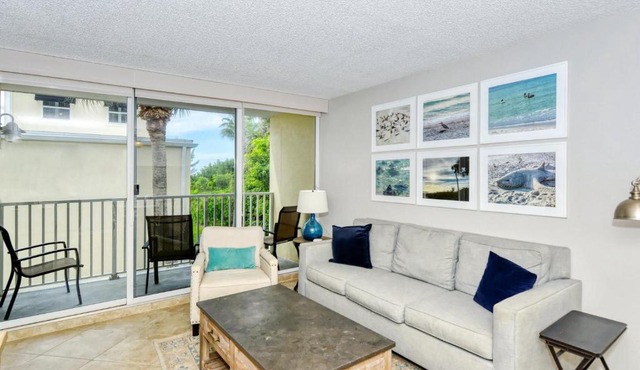 LaPlaya 202E Catch the gentle Gulf breezes on your private balcony beneath the swaying palms