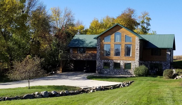 Large 3 Level Cabin located on 2 acres across the road from East Lake Okoboji
