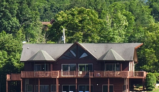 Large 5 bedroom, lakefront home, boat dock, wrap around patio, amazing views!