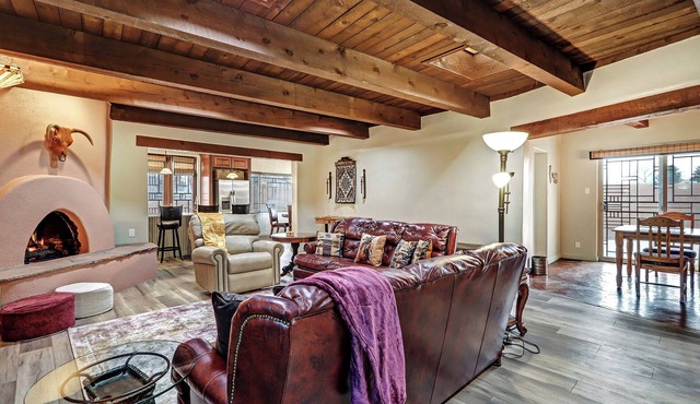 Large and lovely 4/4 adobe home near Old Town. Located on acequia with trails.