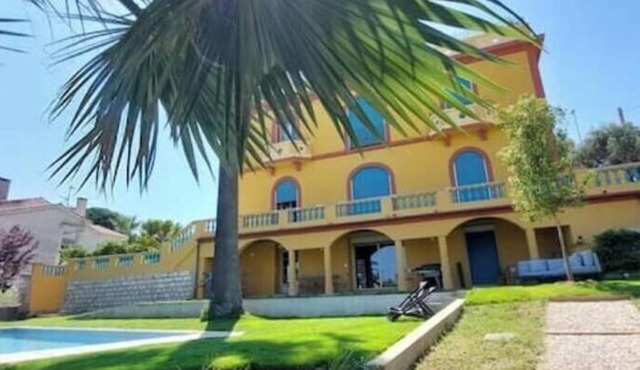 Large apartment in villa with garden and pool