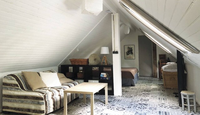 Large bedroom above an artist's studio