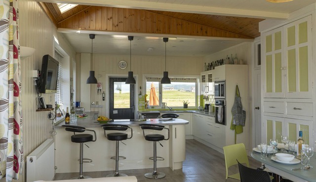 Large Bungalow sleeps 11. Beautiful views, big garden, lots of parking.n