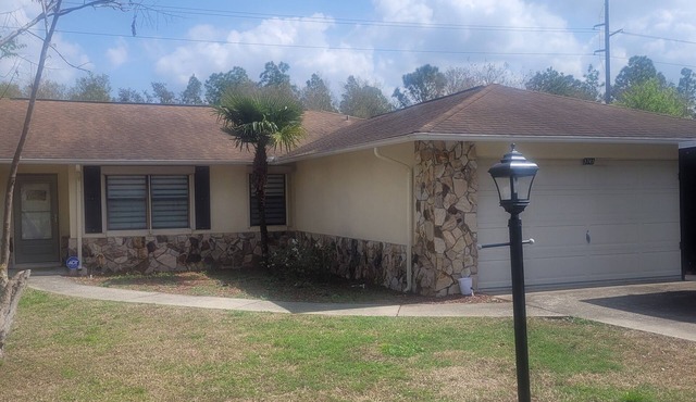 Large Bungalow with fenced yard and game room. Close to everything