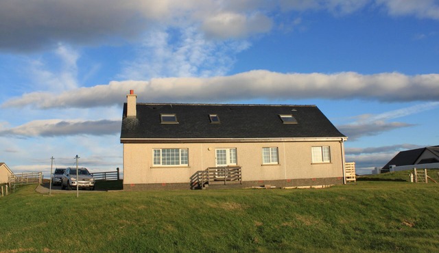 Large bungalow with spectacular views over Stornoway, the Minch and mainland.