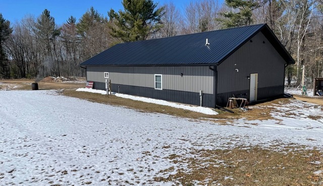 Large cabin with ATV/UTV trail access.
