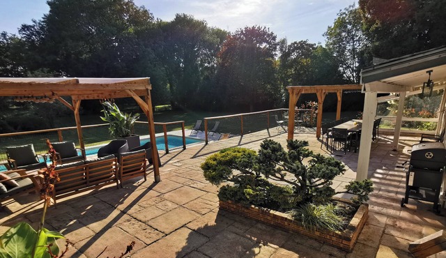 Large country house with heated pool, wooded grounds, lovely terrace.
