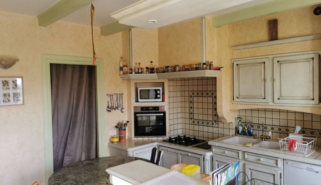 Large country house with swimming pool and playground.